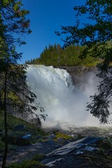 Canvas Print - Scenic view of Tannforsen waterfall in Sweden on a sunny day