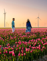 Wall Mural - offshore windmill park with clouds and a blue sky, wind mill turbines in the Netherlands