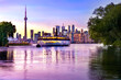 Toronto night skyline with ferry