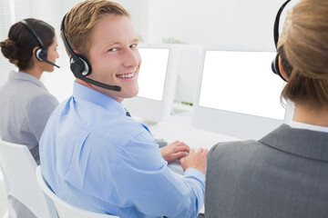 Poster - Digital png photo of caucasian business colleagues using computers on transparent background