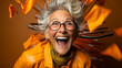 Exhilarating image of overjoyed elderly woman with hair flying, radiantly laughing against a saturated studio background. Dynamic and expressive.