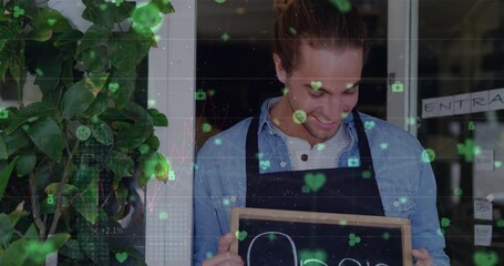 Poster - Animation of connected icons, smiling caucasian male holding slate with open text on door of cafes