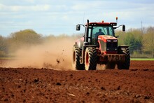Tractor plowing a field with seedbed cultivator in early spring, Application of manure on arable farmland, AI Generated