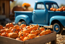 A Lot Of Orange Pumpkins At Outdoor Farmers Market With Blue Retro Truck On Background, Autumn Harvest Concept. Sunny October Outdoor Afternoon. Background For Fall. Copy Space For Your Text.