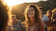 Young Woman Leading A Group Of People In Laughter Yoga Session On A Mountaintop At Sunrise, Their Laughter Echoes Through The Serene Landscape As They Embrace The Healing Power Of Laughter And Nature
