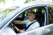 © F8  \ Suport Ukraine - Middle aged man driving a car in city