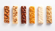 Perspective of Set with different delicious granola protein bars on isolated on white background.