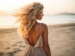 © duyina1990 - Outdoor fashion portrait of beautiful sensual lady wearing stylish maxi chiffon dress posing at sunset in the beach, have long blonde hairs bright make up and accessorizes