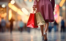 Woman walking with color shopping bags at shopping center. Generative AI