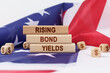 On the US flag and wooden plates with the inscription - rising bond yields