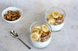 © Irina - banana chia pudding with walnut and banana slices in drinking glasses