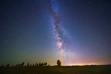Wall Mural - Night landscape with colorful Milky Way, autumn sky