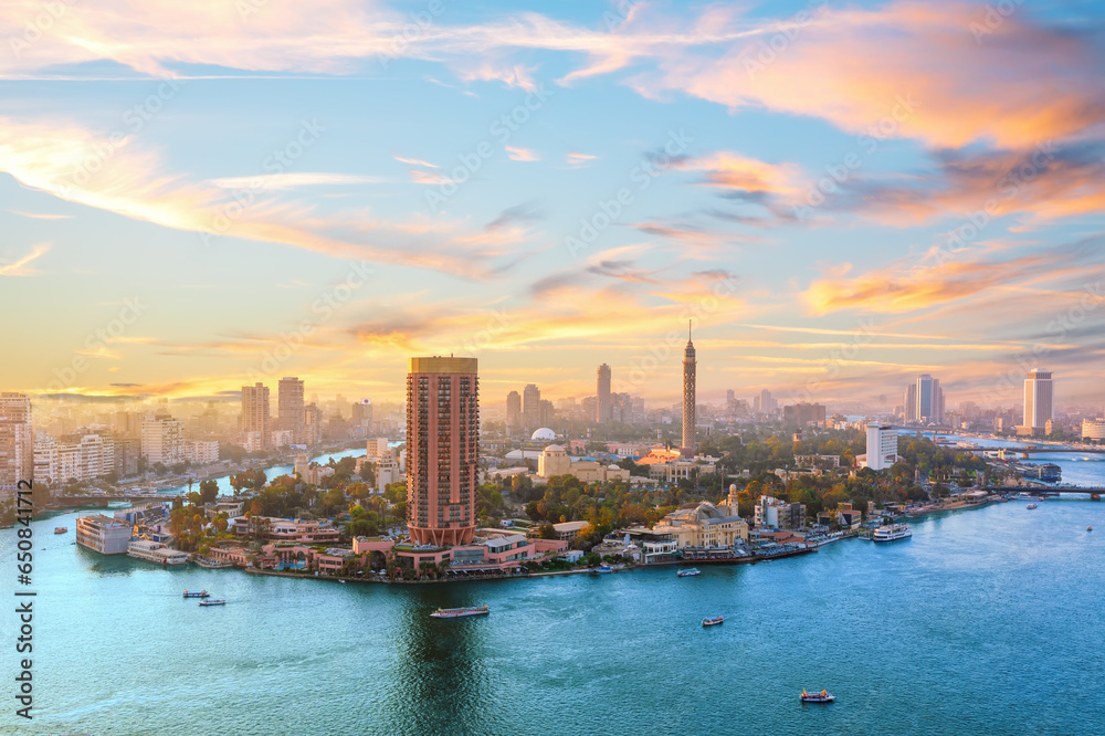 Sunset over the Nile river, fancy buildings and TV tower of Cairo ...