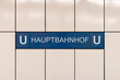 Hauptbahnhof (main station) sign of the U-Bahn (underground) in Berlin, Germany. Location name on the tiled wall for the public transportation. Travel destination for many tourists.