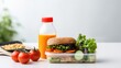Lunch box with sandwich, vegetables, fruits and orange juice bottle, front view on isolated white background, generative ai