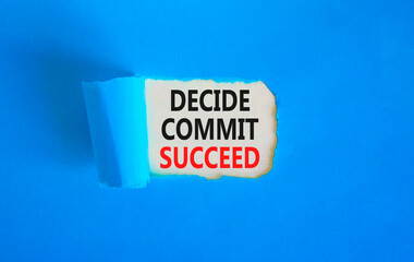 Wall Mural - Decide commit succeed symbol. Concept word Decide Commit Succeed on beautiful white paper. Beautiful blue table blue background. Business decide commit succeed concept. Copy space.