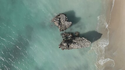 Canvas Print - Drone seascape with rock beach on a sunny day