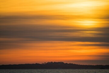 Sticker - Breathtaking sunrise over the tranquil waters of Long Island Sound and Fishers Island, NY