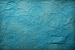 Die Textur von blauem Papier zerknittert - Hintergrund für verschiedene Zwecke