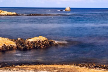 Canvas Print - Idyllic summer scene featuring a stunning ocean view with a clear blue sky