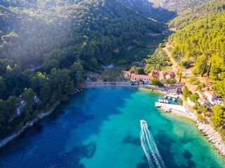 Sticker - Aerial view of the scenic Island Hvar Bay Smarska on a sunny day with a sailing boat