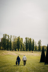 Sticker - Vertical shot of people at the Domaine national de Marly park in Marly-le-Roi, France