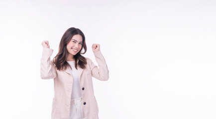 Cheerful excited successful business woman raise fist fight worker standing over isolated white background. Success young asian mixed race girl holding raise fist smiling expression positive on white.