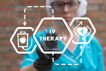 Doctor or nurse using virtual touchscreen sees inscription: IV THERAPY. Medicine concept of IV therapy. Maintenance and restoration of human immune system with vitamin IV infusion therapy.