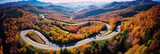 Fototapeta  - aerial view of aerial view of fall road curves of beautiful scenic mountains around, generative AI