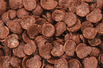 Cereal chocolate flavor, sweet crunchy. Textured background
