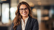 © EmmaStock - The businesswoman smiling in the office