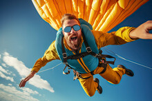 Man Jumping With A Parachute.