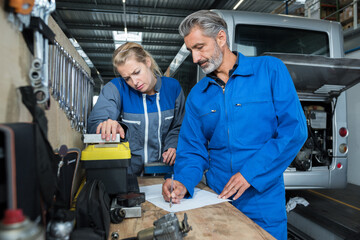 a bus maintenance team worker