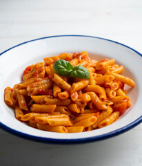 Wall Mural - Italian macaroni with tomato and basil sauce.