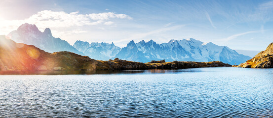 Wall Mural - Beautiful sunrise on Chesery lake (Lac De Cheserys) in French Alps. Monte Bianco mountains range on background. Landscape photography, Chamonix, France