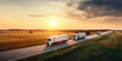 delivery cargo trucks driving in motion on highway road in country field and sunset landscape concept of lorry logistic freight transportation business
