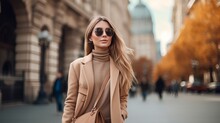Young Elegant Fashionable Woman In Camel-colored Coat, Trendy Sunglasses, And Turtleneck In Outdoor Autumn Portrait