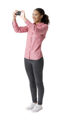 smiling woman taking pictures with her phone