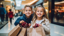 Cute Little Girl And Boy Children Doing Shopping With Paper Bags In A Mall