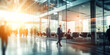 © Bojan - Busy business people in a modern hall at sunset. Group of busy people walking fast in office. Motion blur