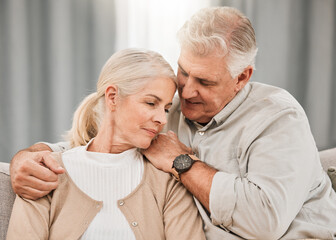 Wall Mural - Old couple, hug and relax on sofa with empathy and support, bonding while at home with trust and comfort. People with time together, marriage or partner in retirement, kindness and love with respect