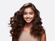 Hair frizz woes addressed! Indian beauty in a commercial, her hair exuding smoothness, thanks to frizz control products isolated on white background