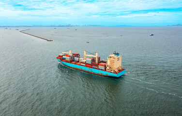 Wall Mural - Top viewContainer ship loading and unloading in sea port, Aerial view of business logistic import and export freight transportation in harbor, Container loading Cargo freight ship, Dubai