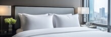 close up  bedroom Interior of a contemporary white soft pillow bedmaid arrange in suites bedroom house interior background