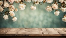 Vintage Wooden Table Top With White Roses And Blurred Blue Teal Background. Old Wooden Countertop With Retro Wallpaper Backdrop Mockup For Product Presentation Display Montage Showcase Advertising
