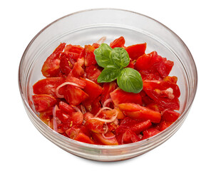 Poster - Salad of cut raw tomatoes with onion  .dressed with olive oil and basil leaves in glass bowl isolated