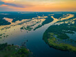 Scenic aerial sunset view of rainforest water jungle in Amazonas Brazil