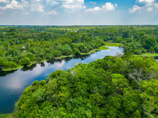 Scenic aerial sunset view of rainforest river in Amazonas Brazil