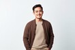 © Robert MEYNER - Medium shot portrait photography of a Vietnamese man in his 30s against a white background