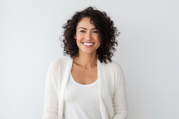 Wall Mural - Lifestyle portrait photography of a Peruvian woman in her 30s against a white background